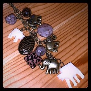 Long necklace elephant zebra cheetah purple stones
